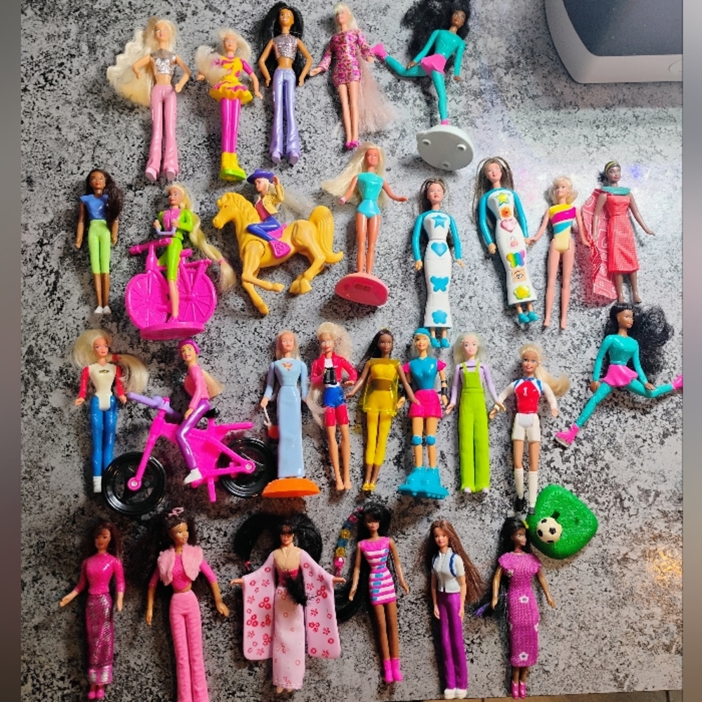 Barbie Fashion Doll Collection with Pink, Blue, and Yellow Outfits